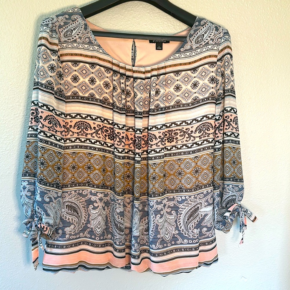 Pink and blue patterned Roz & Ali blouse with bow tie sleeve details